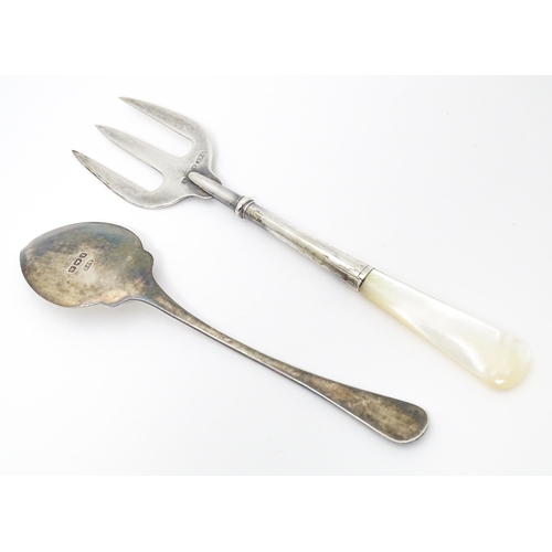 441 - A mother of pearl handled fork hallmarked Birmingham 1915 maker Thomas H Vale Ltd. together with a p... 