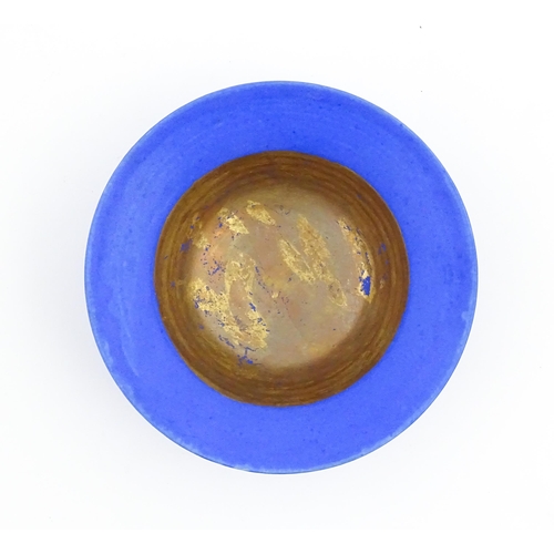 105 - A studio pottery bowl by Mary Rich with cobalt blue and gilt detail. Makers mark to rim of base. App... 