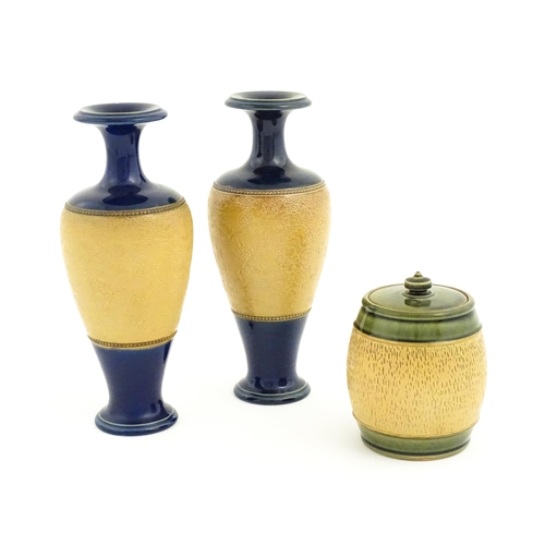 123 - A pair of Royal Doulton Slaters patent stoneware vases with blue glaze and relief banded detail. Mar... 