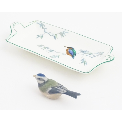 131 - A Royal Copenhagen model of a blue tit. Together with a Royal Doulton dish of oblong dish with hand ... 