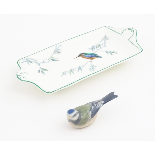 131 - A Royal Copenhagen model of a blue tit. Together with a Royal Doulton dish of oblong dish with hand ... 