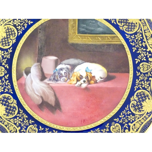 132 - A Paragon plate hand painted by F. Micklewright The Cavalier's Pets after Sir Edwin Landseer. Signed... 