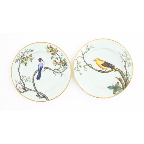 135 - A quantity of Victorian Minton wares to include plates, cups and saucers, each decorated with hand p... 