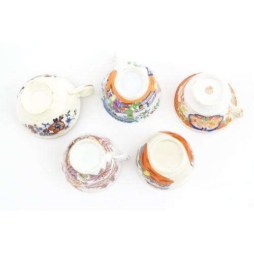 156 - A quantity of assorted cups and saucers, etc. with chinoiserie decoration. Plate approx. 8