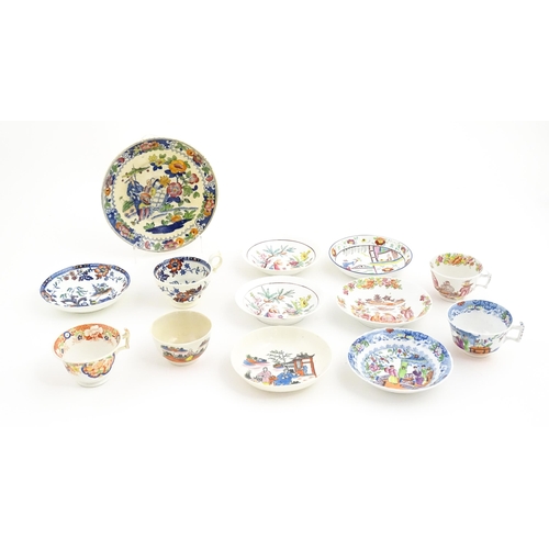 156 - A quantity of assorted cups and saucers, etc. with chinoiserie decoration. Plate approx. 8