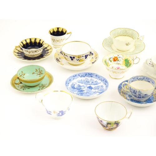 164 - A quantity of assorted tea cups and saucers to include examples by Rockingham, Bloor Derby, etc. Lar... 