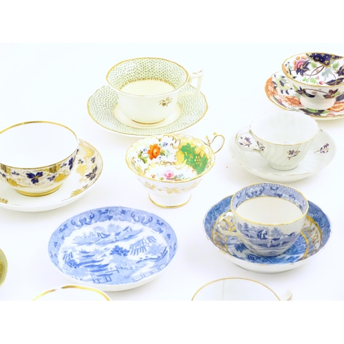 164 - A quantity of assorted tea cups and saucers to include examples by Rockingham, Bloor Derby, etc. Lar... 