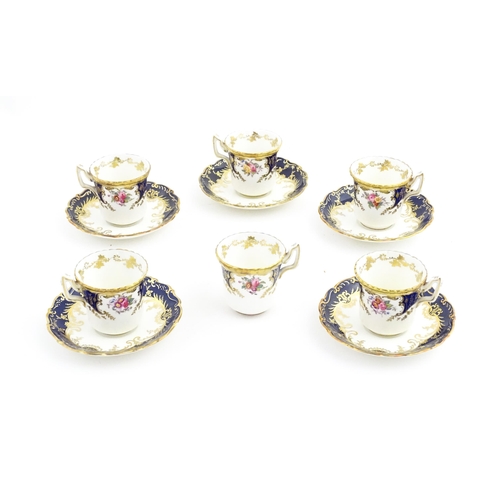 165 - A quantity of Coalport tea / coffee wares in the Sandringham pattern, comprising cups and saucers. M... 