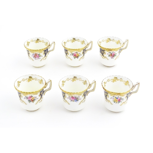 165 - A quantity of Coalport tea / coffee wares in the Sandringham pattern, comprising cups and saucers. M... 