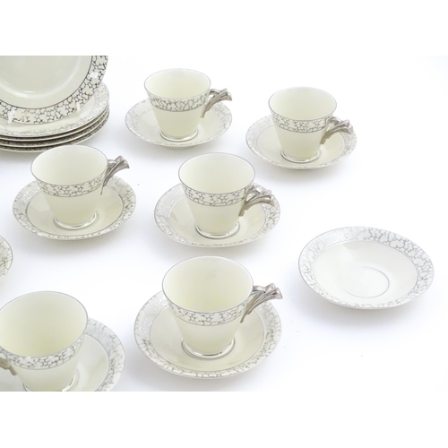 168 - A quantity of Art Deco style tea wares with banded detail comprising plates, cups and saucers. Cups ... 