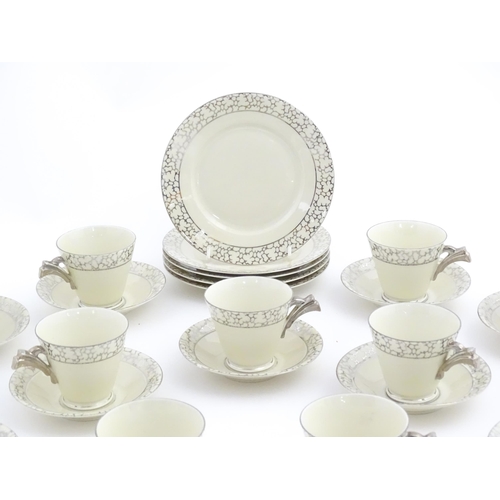 168 - A quantity of Art Deco style tea wares with banded detail comprising plates, cups and saucers. Cups ... 