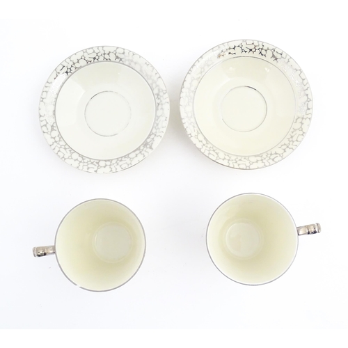 168 - A quantity of Art Deco style tea wares with banded detail comprising plates, cups and saucers. Cups ... 