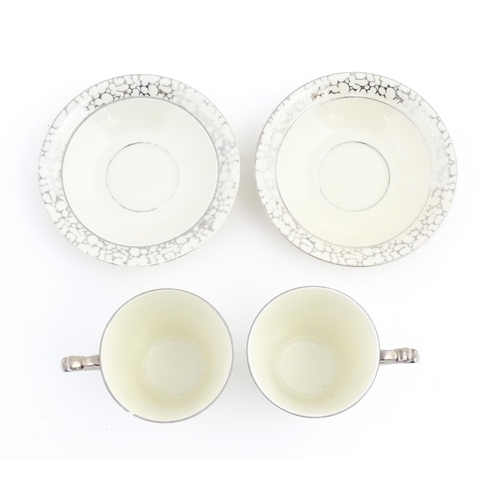 168 - A quantity of Art Deco style tea wares with banded detail comprising plates, cups and saucers. Cups ... 