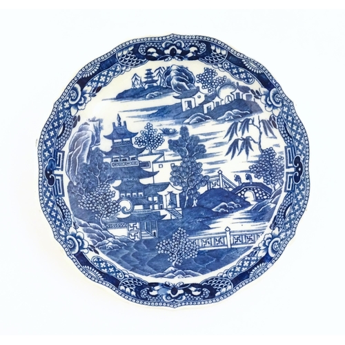 59 - Three assorted Chinese items to include a Cantonese famille rose plate decorated with figures, flowe... 