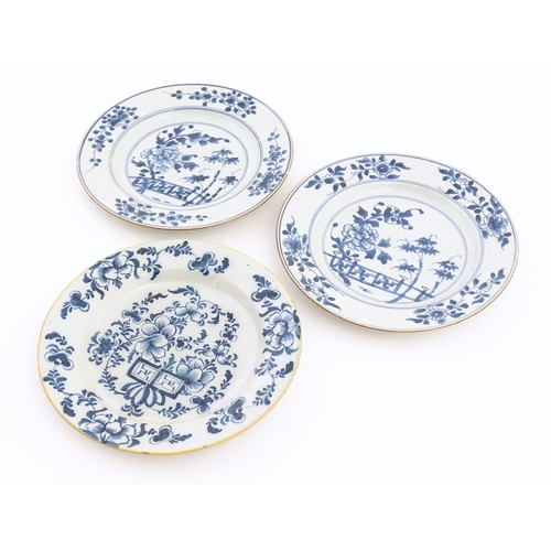 60 - Two Chinese blue and white plates decorated with a peony flower in a garden, with floral border. Bot... 