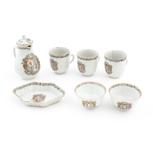 64 - A quantity of Chinese export tea wares with armorial decoration and floral borders, to include tea b... 