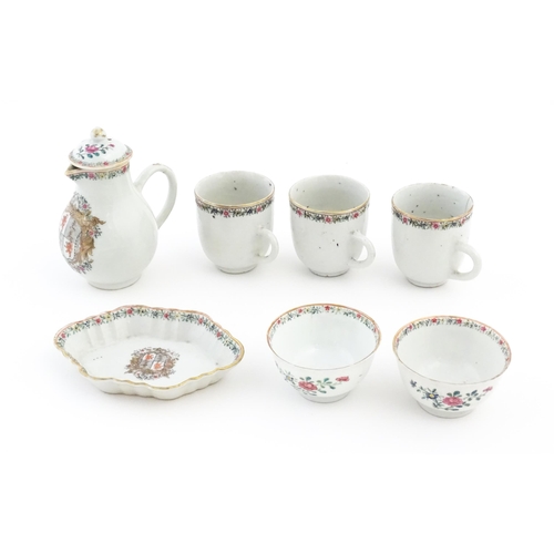 64 - A quantity of Chinese export tea wares with armorial decoration and floral borders, to include tea b... 