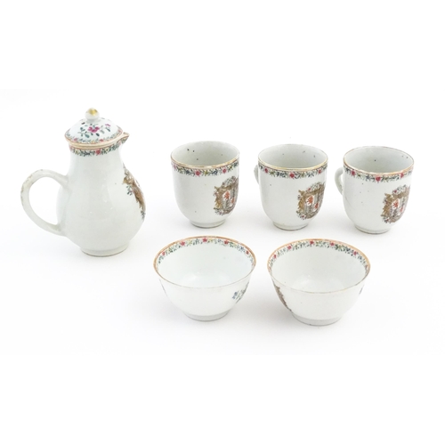 64 - A quantity of Chinese export tea wares with armorial decoration and floral borders, to include tea b... 