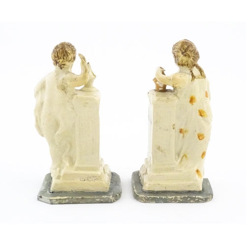 70 - A pair of English creamware pottery Classical figures with column detail. Approx. 4 3/4