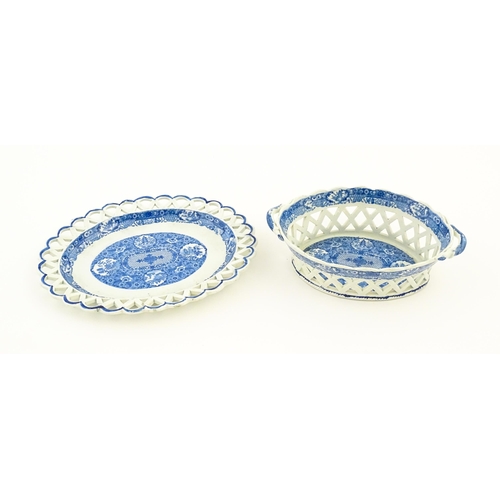 76 - A Spode blue and white twin handled chestnut basket and stand decorated in the Chinoiserie Net patte... 