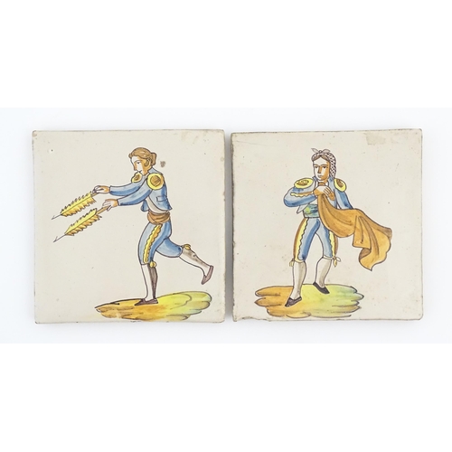 83 - A pair of Spanish tiles with hand painted bullfighter decoration, one depicting a picador, the other... 