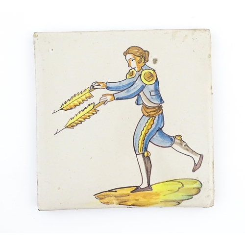 83 - A pair of Spanish tiles with hand painted bullfighter decoration, one depicting a picador, the other... 