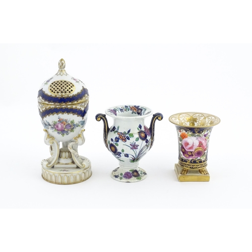 87 - Two Continental porcelain items comprising a Serves style pot pourri holder of egg form with floral ... 