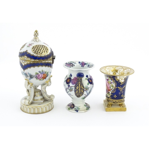 87 - Two Continental porcelain items comprising a Serves style pot pourri holder of egg form with floral ... 