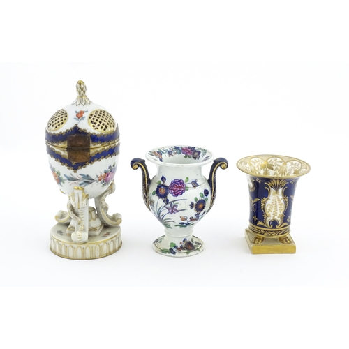 87 - Two Continental porcelain items comprising a Serves style pot pourri holder of egg form with floral ... 