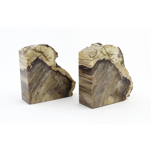 1060 - A pair of polished hardstone specimen / geode bookends. Approx. 6 3/4