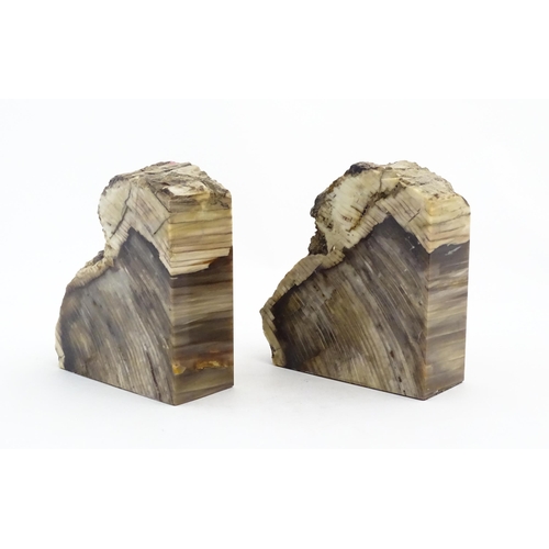 1060 - A pair of polished hardstone specimen / geode bookends. Approx. 6 3/4