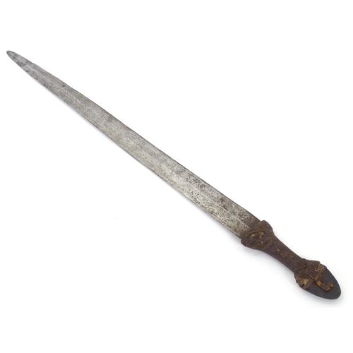 1077 - Militaria / Arms & Armour : a 19thC Tebu sword (Chad, Central Africa), the 28 1/2