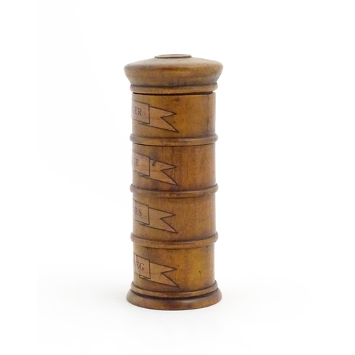 1082 - A four tier treen spice tower labelled Ginger, Mace, Cloves, and Nutmeg. Approx. 7 1/2