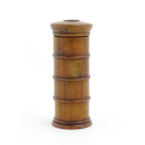 1082 - A four tier treen spice tower labelled Ginger, Mace, Cloves, and Nutmeg. Approx. 7 1/2