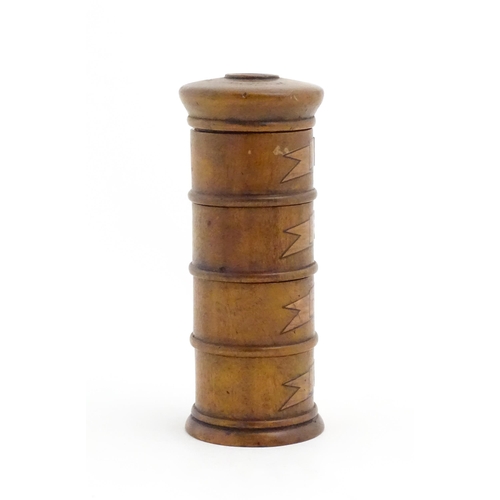 1082 - A four tier treen spice tower labelled Ginger, Mace, Cloves, and Nutmeg. Approx. 7 1/2