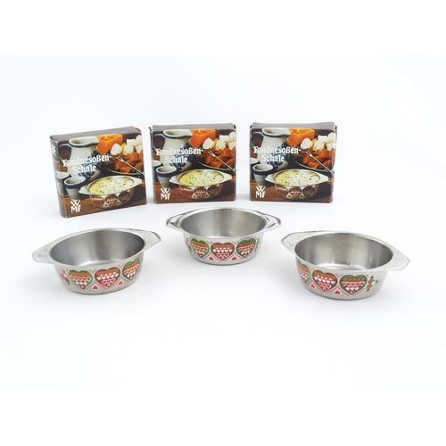 1084 - Three German WMF fondue bowls with heart decoration. Boxed. Bowls approx. 5 1/2