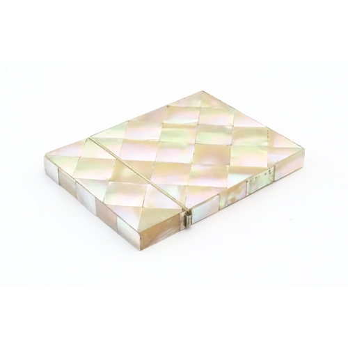 1118 - A Victorian mother of pearl card case of rectangular form. Approx. 4