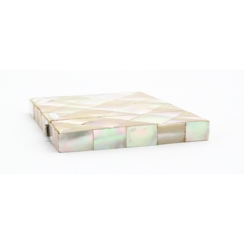 1118 - A Victorian mother of pearl card case of rectangular form. Approx. 4