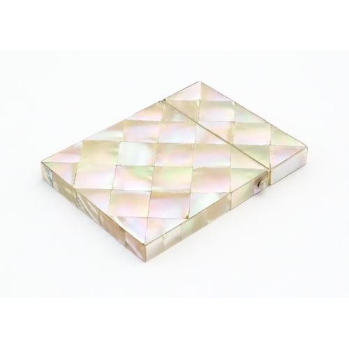 1118 - A Victorian mother of pearl card case of rectangular form. Approx. 4