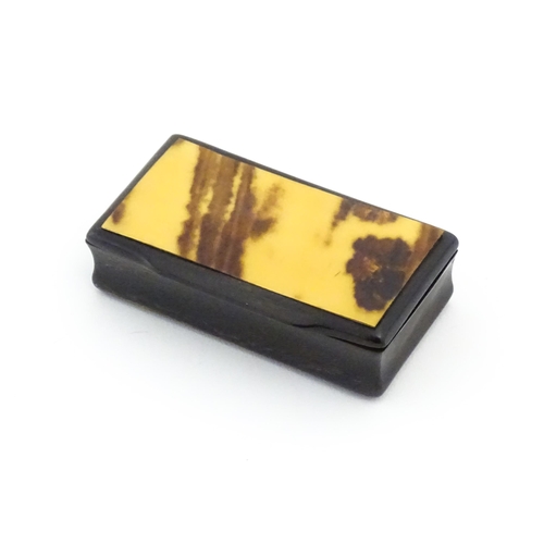 1132 - A late 19thC horn snuff box of rectangular form. Approx. 3 1/4