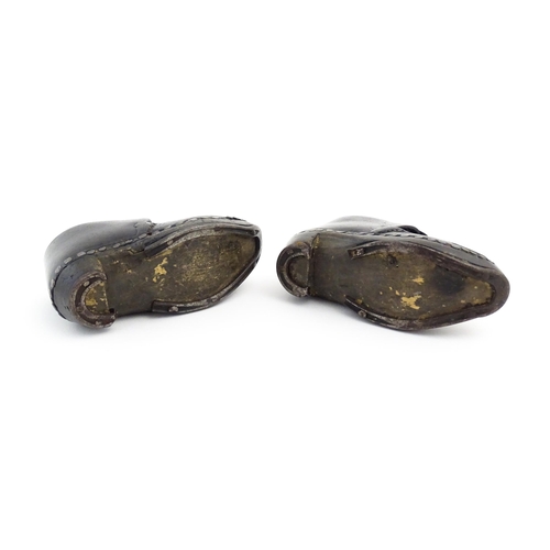 1138 - A pair of late 19th / early 20thC children's leather Lancashire clogs with stud detail and wooden an... 