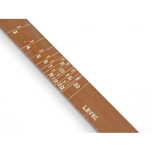 1150 - An M.D.S. Ltd. surveyor's folding triangle rule with inset spirit level and plumb bob. No. B.49645. ... 