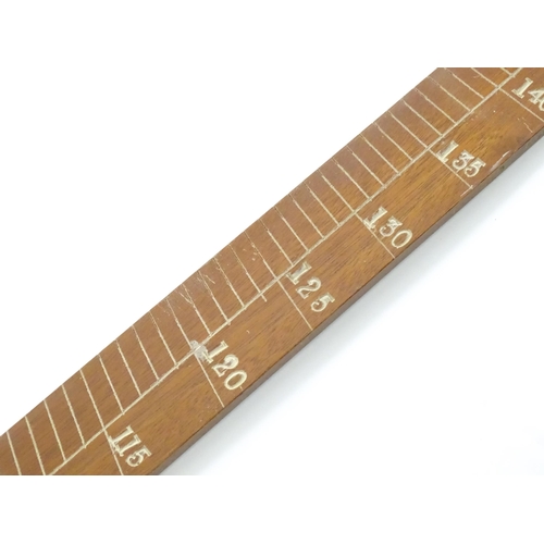 1150 - An M.D.S. Ltd. surveyor's folding triangle rule with inset spirit level and plumb bob. No. B.49645. ... 