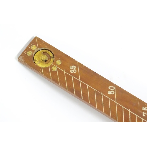 1150 - An M.D.S. Ltd. surveyor's folding triangle rule with inset spirit level and plumb bob. No. B.49645. ... 