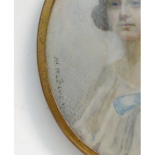 1155 - A 20thC watercolour portrait miniature depicting a seated young girl in a white dress with a blue bo... 