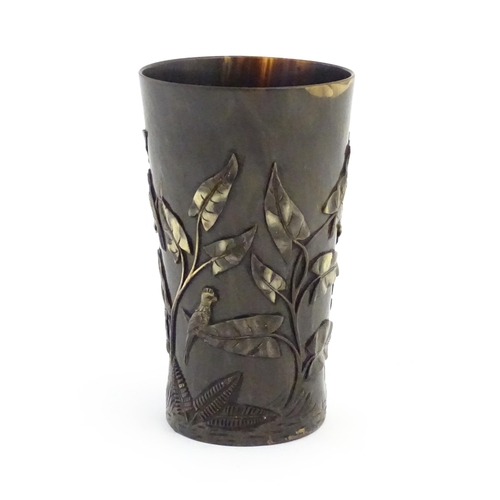 1171 - A late 19th / early 20thC horn beaker with carved decoration depicting parrot birds, ferns, foliage ... 