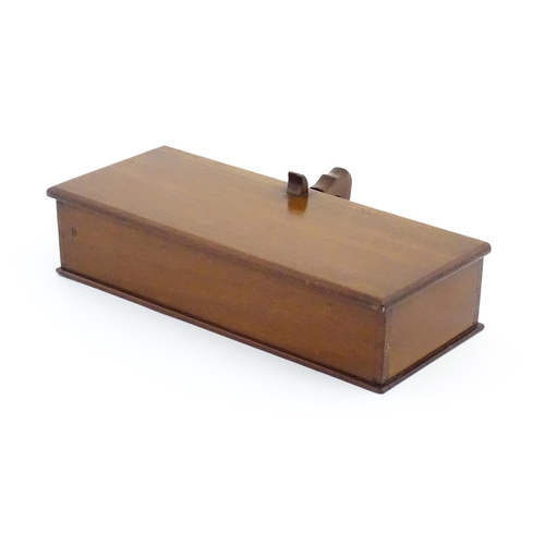 1188 - A mahogany box with handle and thumbpiece to side, the lid hinging open to reveal four compartmental... 