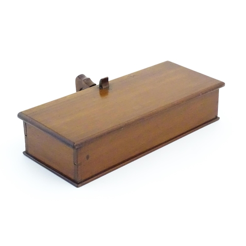 1188 - A mahogany box with handle and thumbpiece to side, the lid hinging open to reveal four compartmental... 