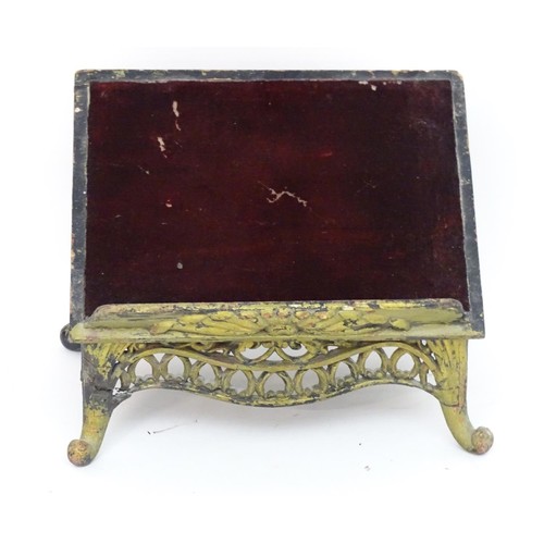 1237 - A mid / late 19thC bible / reading stand with an ebonised pierced frame and Gothic decoration, with ... 