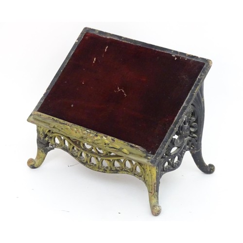 1237 - A mid / late 19thC bible / reading stand with an ebonised pierced frame and Gothic decoration, with ... 